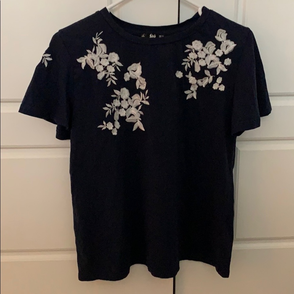 Navy and white flutter sleeve t-shit.